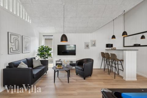 Aktivitätsraum im Luxusferienhaus Nr. 614 mit 6 Schlafzimmern und Platz für 16 Gäste.