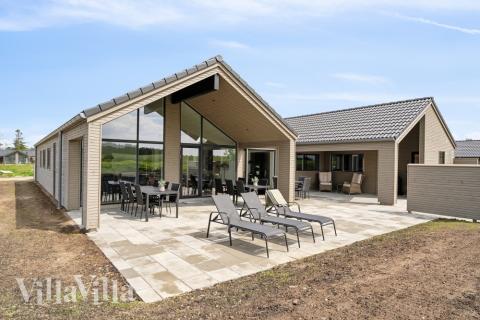 Das Luxusferienhaus Nr. 614 hat eine tolle Terrasse, die mit hochwertigen Gartenmöbeln für 16 Personen ausgestattet ist.