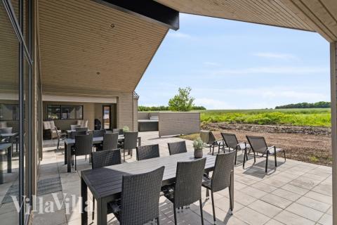 Genießen Sie einen Grillabend auf der Terrasse des Luxusferienhauses Nr. 614 in Fünen und seine Inseln