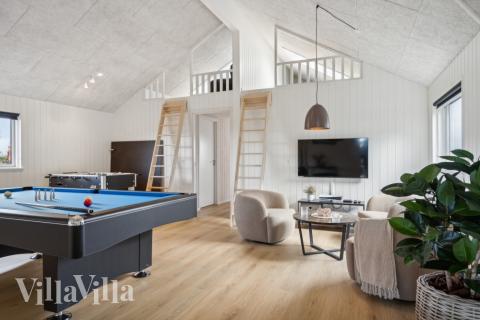 Das Luxusferienhaus 617 für 14 Personen hat einen großen Aktivitätsraum mit u. a. Billard und Darts