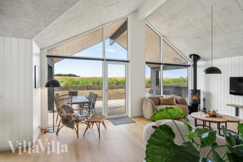 Die Couch im Luxusferienhaus Nr. 617 in Fünen und seine Inseln lädt zu Gesellschaftsspielen oder zu Kinoabenden ein.