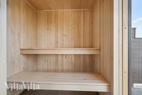 Genießen Sie die heiße Sauna im Luxusferienhaus Nr. 617 für 14 Personen