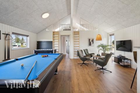 Neben den vielen schönen Stunden, die man im Poolbereich des Hauses verbringen kann, bietet das Luxusferienhaus 618 auch Spielevergnügen bei Billard/Tischtennis und Darts