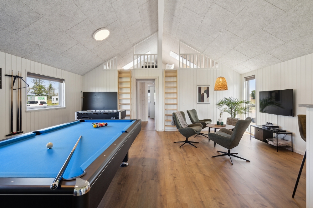 Neben den vielen schönen Stunden, die man im Poolbereich des Hauses verbringen kann, bietet das Luxusferienhaus 618 auch Spielevergnügen bei Billard/Tischtennis und Darts