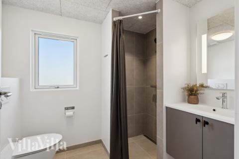 Eines der Badezimmer im Luxusferienhaus Nr. 618