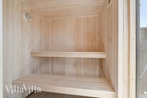 Genießen Sie die heiße Sauna im Luxusferienhaus Nr. 618 für 16 Personen