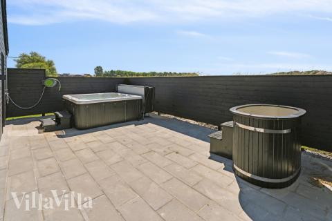 Das Luxusferienhaus Nr. 618 bietet u. a. einen tollen Whirlpool