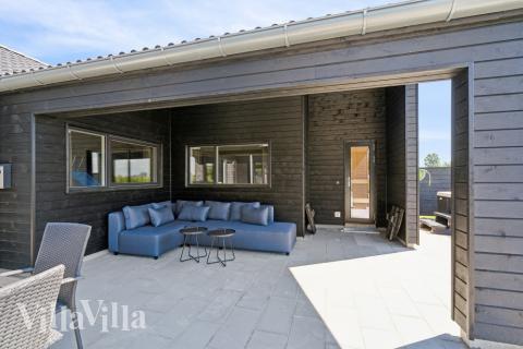 Das Luxusferienhaus Nr. 618 hat eine tolle Terrasse, die mit hochwertigen Gartenmöbeln für 16 Personen ausgestattet ist.