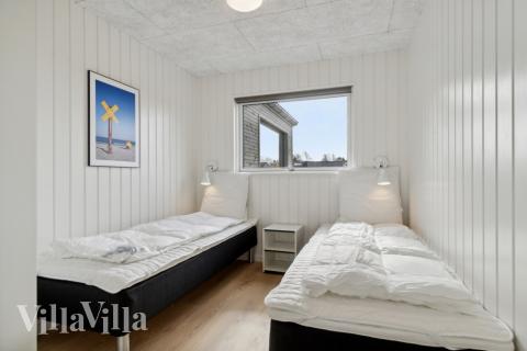 Eines der 12 Schlafzimmer im Luxusferienhaus Nr. 619