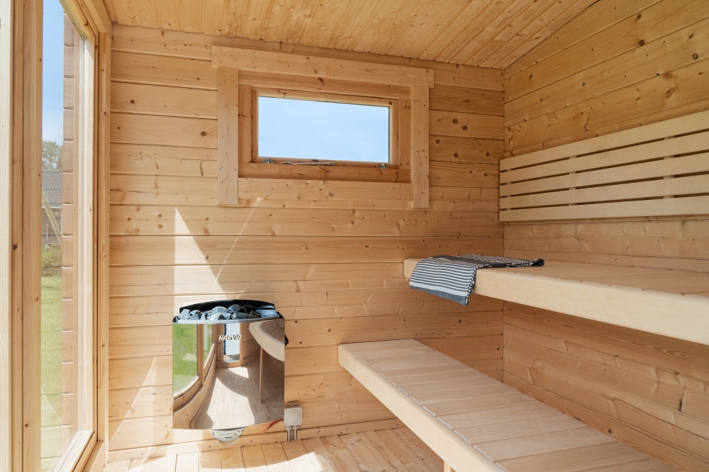Genießen Sie die heiße Sauna im Luxusferienhaus Nr. 620 für 12 Personen