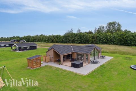 Dieses schöne Poolhaus Nr. 620 mit Platz für 12 Personen liegt in Lolland/Falster/Mön