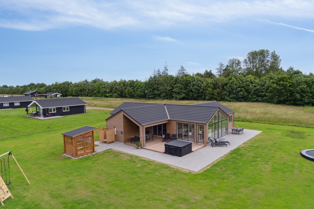 Dieses schöne Poolhaus Nr. 620 mit Platz für 12 Personen liegt in Lolland/Falster/Mön