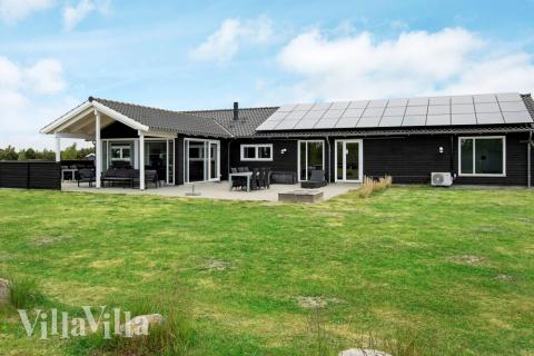 Dieses schicke Poolhaus Nr. 626 liegt in Lolland/Falster/Mön und bietet Platz für 14 Personen.