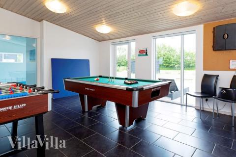 Neben den vielen schönen Stunden, die man im Poolbereich des Hauses verbringen kann, bietet das Luxusferienhaus 626 auch Spielevergnügen bei Billard/Tischtennis und Darts
