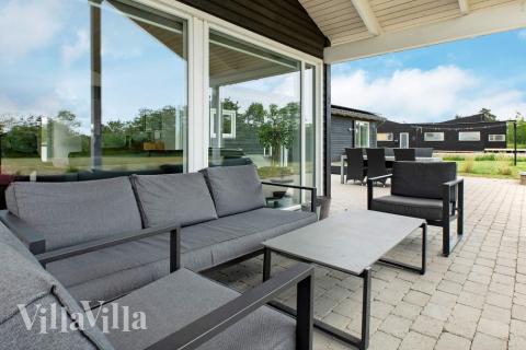 Das Luxusferienhaus Nr. 626 hat eine tolle Terrasse, die mit hochwertigen Gartenmöbeln für 14 Personen ausgestattet ist.