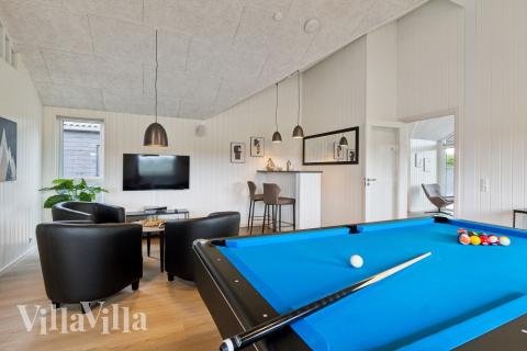 Neben den vielen schönen Stunden, die man im Poolbereich des Hauses verbringen kann, bietet das Luxusferienhaus 631 auch Spielevergnügen bei Billard/Tischtennis und Darts