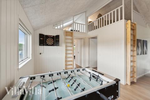 Das Luxusferienhaus 631 für 18 Personen hat einen großen Aktivitätsraum mit u. a. Billard und Darts