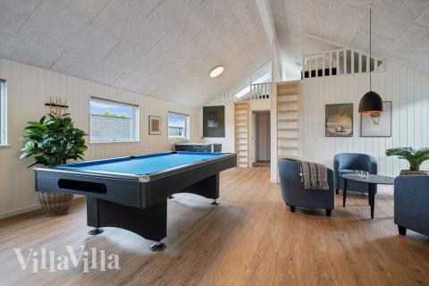 Neben den vielen schönen Stunden, die man im Poolbereich des Hauses verbringen kann, bietet das Luxusferienhaus 632 auch Spielevergnügen bei Billard/Tischtennis und Darts