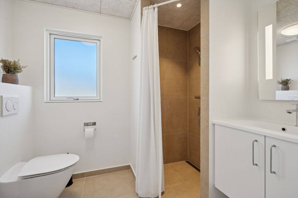 Eines der Badezimmer im Luxusferienhaus Nr. 633