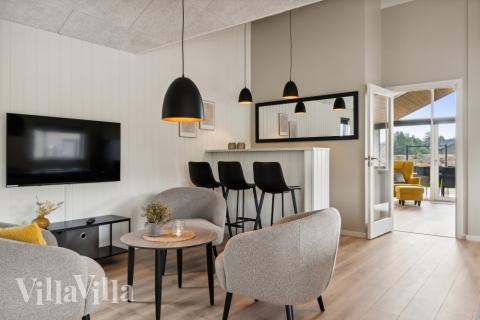 Die tollen Ferienhäuser sind unter anderem mit einer Bar ausgestattet, wie in diesem Luxusferienhaus 634 in Nordjütland