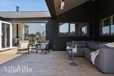 Genießen Sie einen Grillabend auf der Terrasse des Luxusferienhauses Nr. 634 in Nordjütland