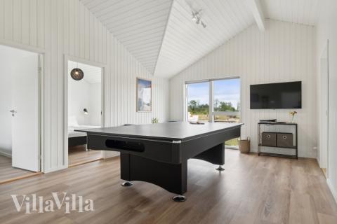 Das Luxusferienhaus 636 für 8 Personen hat einen großen Aktivitätsraum mit u. a. Billard und Darts