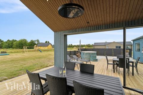 Genießen Sie einen Grillabend auf der Terrasse des Luxusferienhauses Nr. 636 in Nordjütland