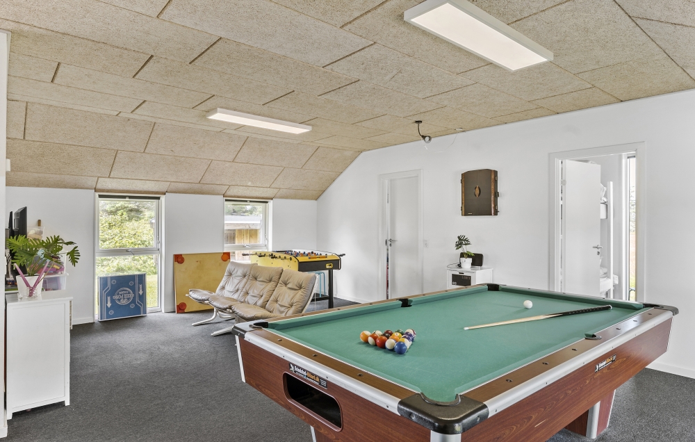 Neben den vielen schönen Stunden, die man im Poolbereich des Hauses verbringen kann, bietet das Luxusferienhaus 637 auch Spielevergnügen bei Billard/Tischtennis und Darts