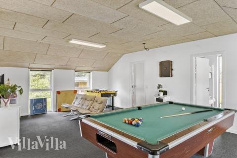 Neben den vielen schönen Stunden, die man im Poolbereich des Hauses verbringen kann, bietet das Luxusferienhaus 637 auch Spielevergnügen bei Billard/Tischtennis und Darts