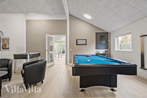 Neben den vielen schönen Stunden, die man im Poolbereich des Hauses verbringen kann, bietet das Luxusferienhaus 638 auch Spielevergnügen bei Billard/Tischtennis und Darts