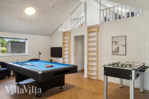 Aktivitätsraum im Luxusferienhaus Nr. 640 mit 5 Schlafzimmern und Platz für 14 Gäste.