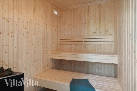 Genießen Sie die heiße Sauna im Luxusferienhaus Nr. 641 für 20 Personen