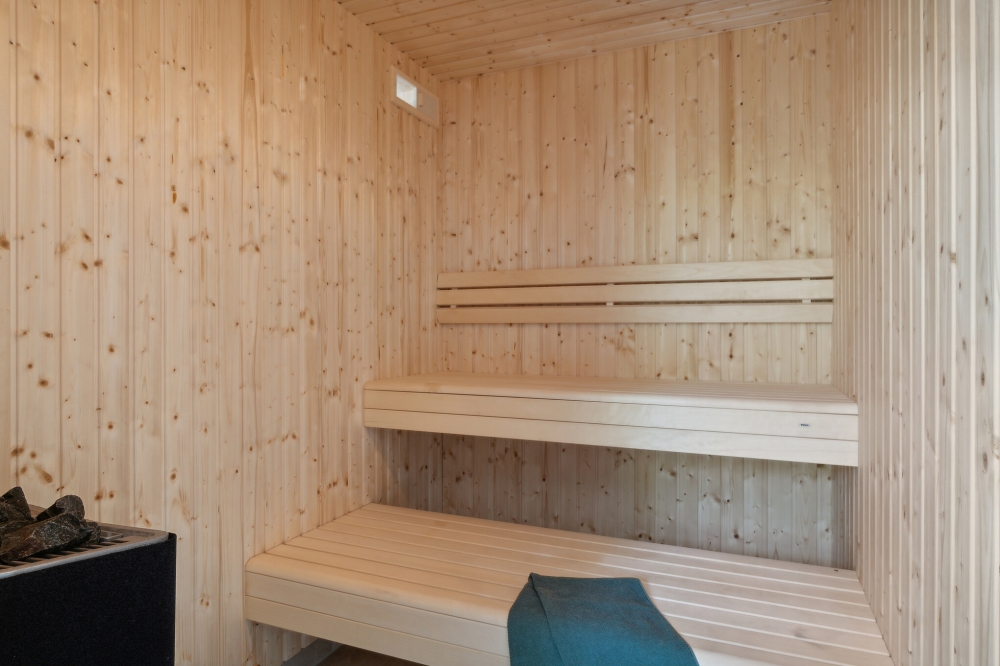 Genießen Sie die heiße Sauna im Luxusferienhaus Nr. 641 für 20 Personen