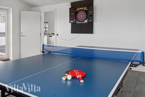 Neben den vielen schönen Stunden, die man im Poolbereich des Hauses verbringen kann, bietet das Luxusferienhaus 642 auch Spielevergnügen bei Billard/Tischtennis und Darts