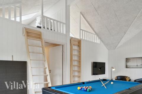 Aktivitätsraum im Luxusferienhaus Nr. 644 mit 5 Schlafzimmern und Platz für 14 Gäste.