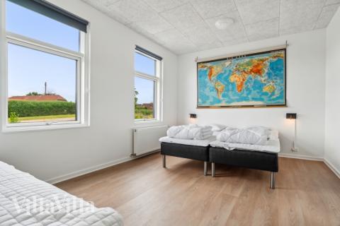 Eines der 14 Schlafzimmer im Luxusferienhaus Nr. 645