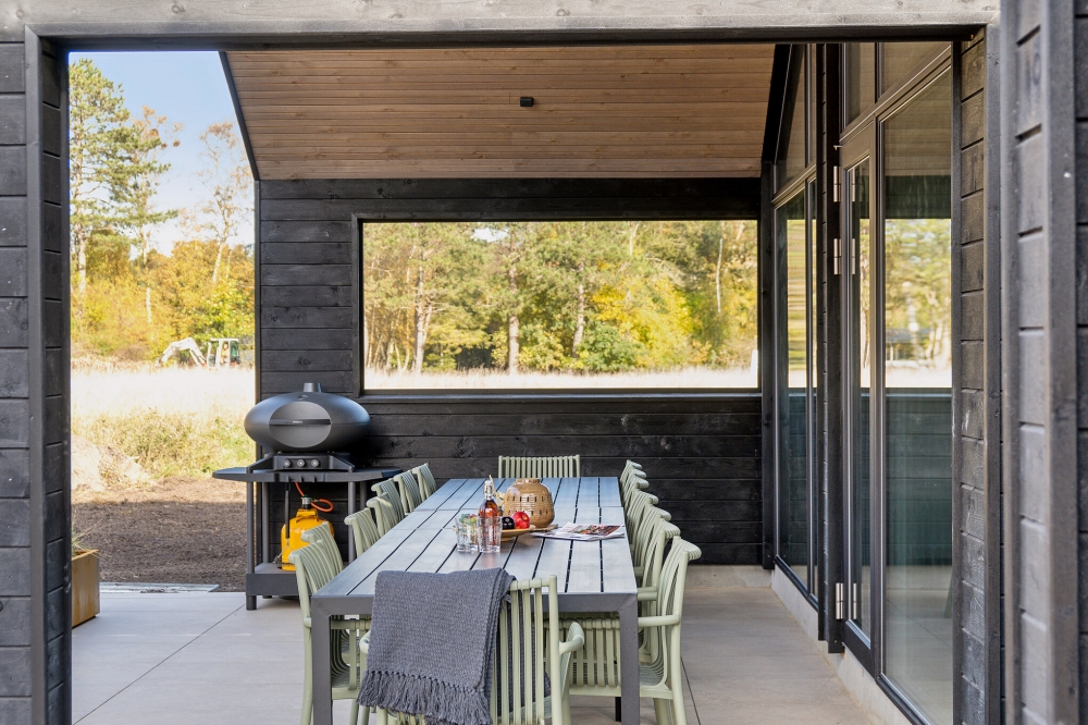 Genießen Sie einen Grillabend auf der Terrasse des Luxusferienhauses Nr. 646 in Nordseeland