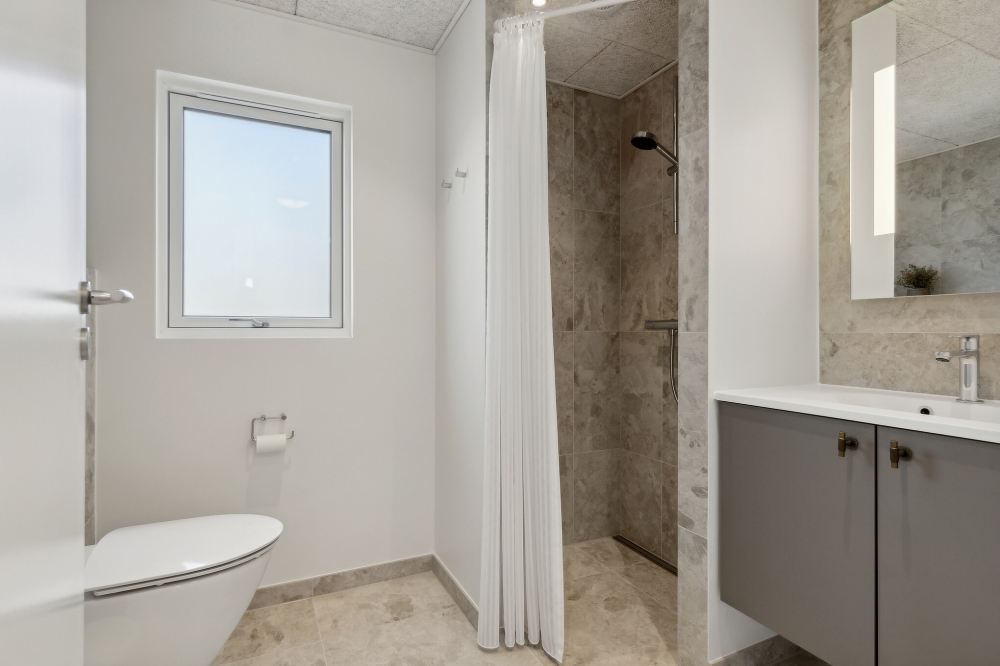 Eines der Badezimmer im Luxusferienhaus Nr. 806