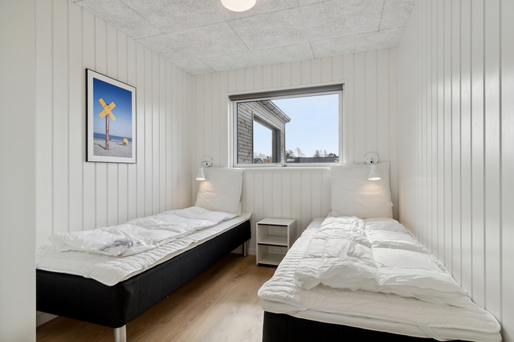 Eines der 12 Schlafzimmer im Luxusferienhaus Nr. 806