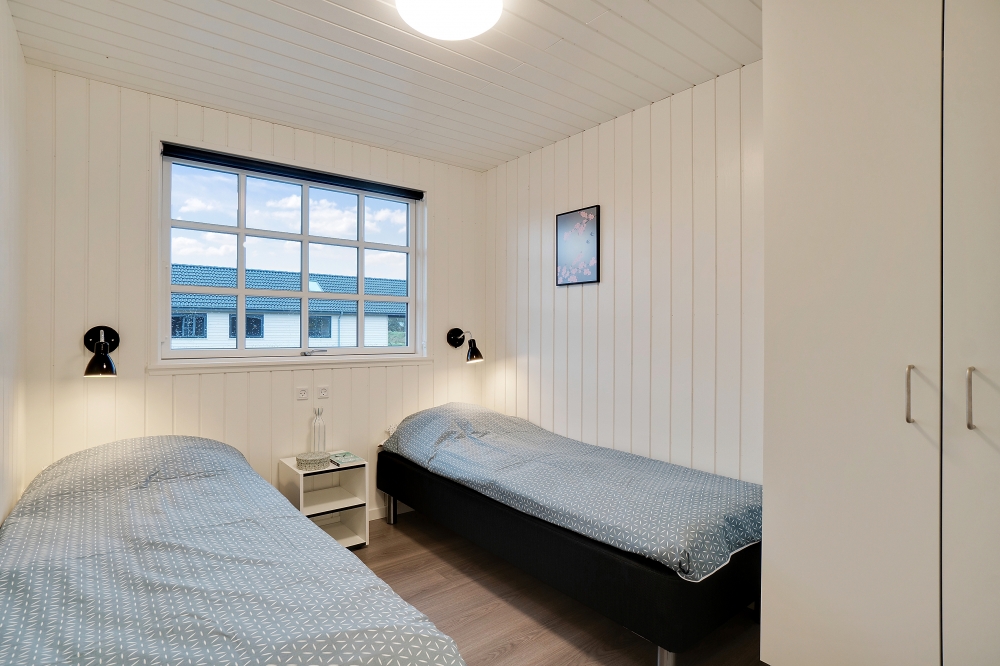 Eines der 7 Schlafzimmer im Luxusferienhaus Nr. 810