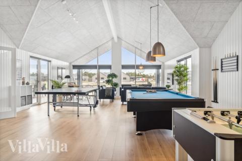 Neben den vielen schönen Stunden, die man im Poolbereich des Hauses verbringen kann, bietet das Luxusferienhaus 814 auch Spielevergnügen bei Billard/Tischtennis und Darts