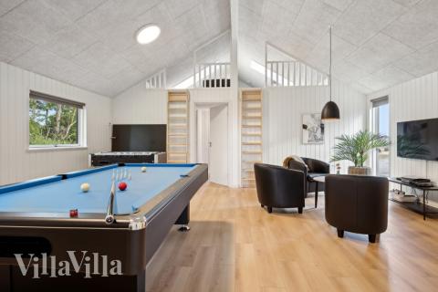 Neben den vielen schönen Stunden, die man im Poolbereich des Hauses verbringen kann, bietet das Luxusferienhaus 818 auch Spielevergnügen bei Billard/Tischtennis und Darts