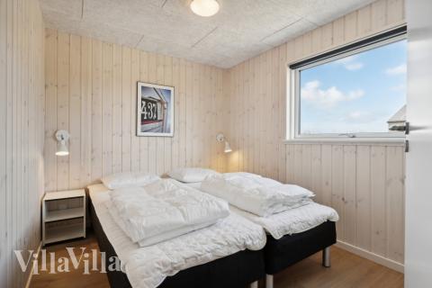 Eines der 12 Schlafzimmer im Luxusferienhaus Nr. 822