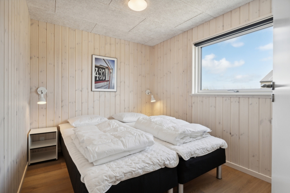 Eines der 12 Schlafzimmer im Luxusferienhaus Nr. 822