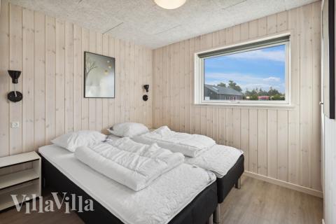 Eines der 8 Schlafzimmer im Luxusferienhaus Nr. 824