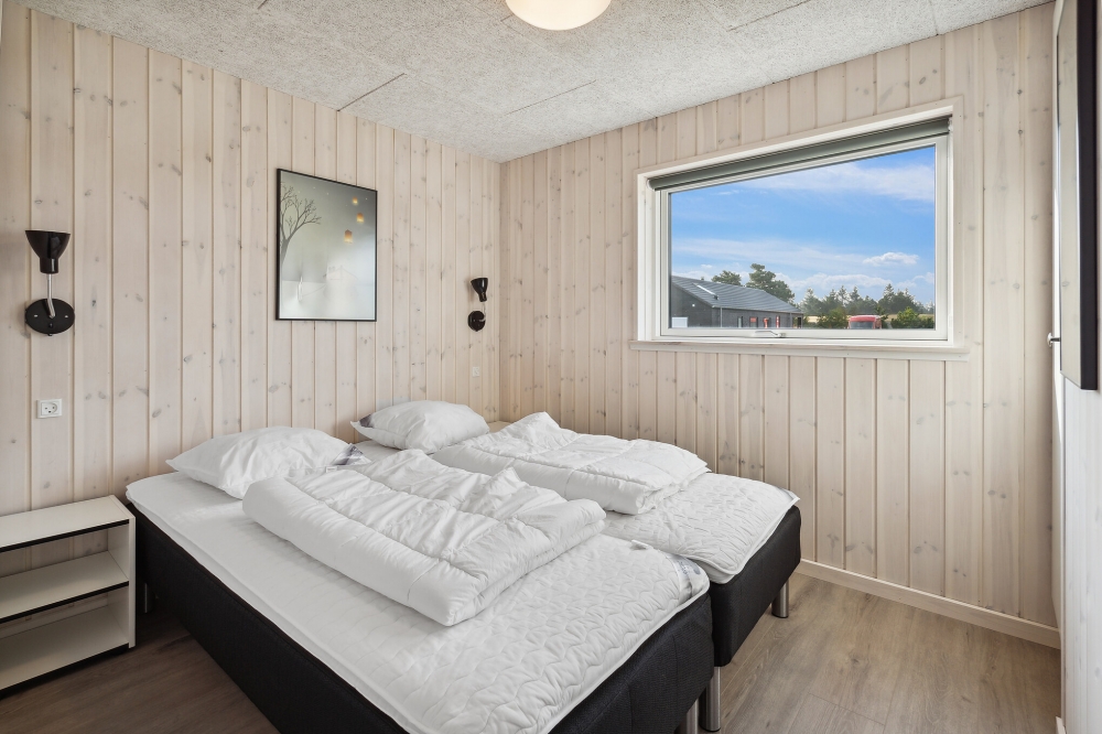 Eines der 8 Schlafzimmer im Luxusferienhaus Nr. 824
