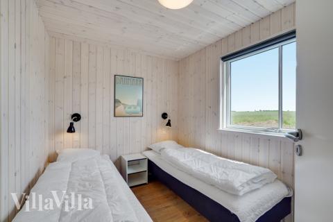 Eines der 10 Schlafzimmer im Luxusferienhaus Nr. 830