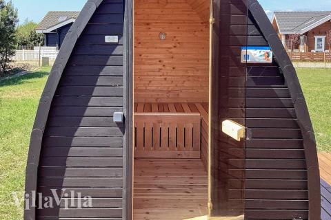 Genießen Sie die heiße Sauna im Luxusferienhaus Nr. 649 für 14 Personen