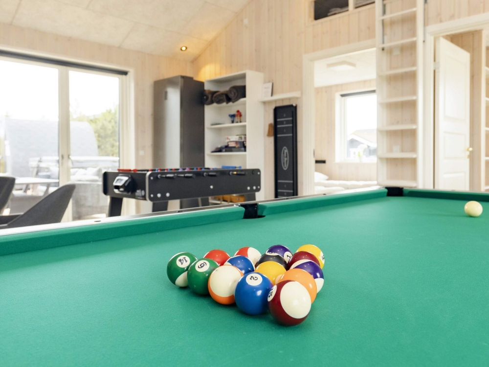 Neben den vielen schönen Stunden, die man im Poolbereich des Hauses verbringen kann, bietet das Luxusferienhaus 649 auch Spielevergnügen bei Billard/Tischtennis und Darts
