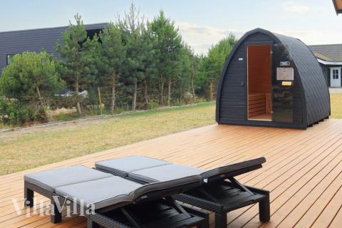 Auf der Terrasse des Ferienhauses Nr. 649 ist Platz für 14 Personen.